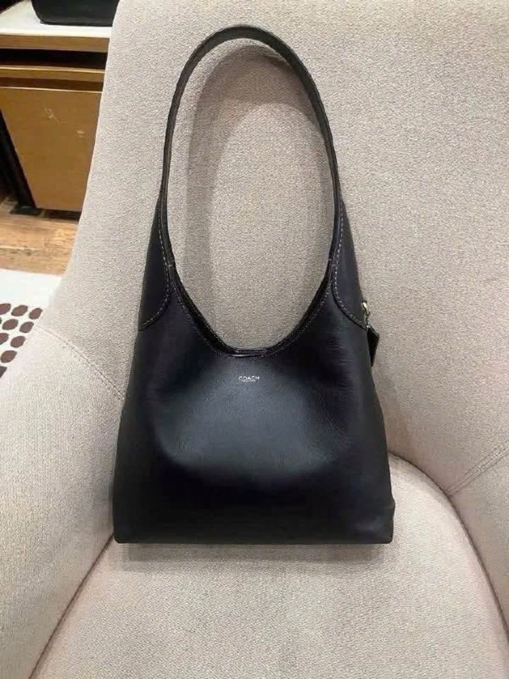 Coach Black Leather Shoulder Bag with Curved Strap